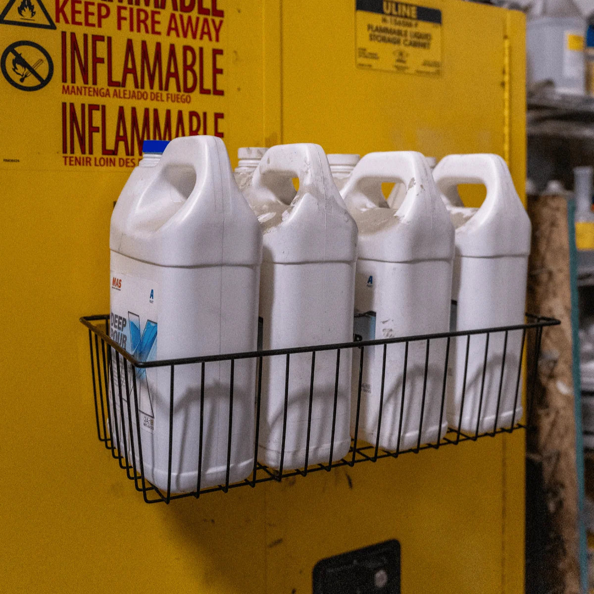 Gator Magnetics The Complete Workshop 10 Bundle — black basket holding six white containers on a yellow flammables cabinet