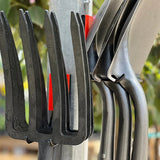 Gator Magnetics The Complete Workshop 10 Bundle — garden rakes hanging from red hooks on an outdoor steel pole